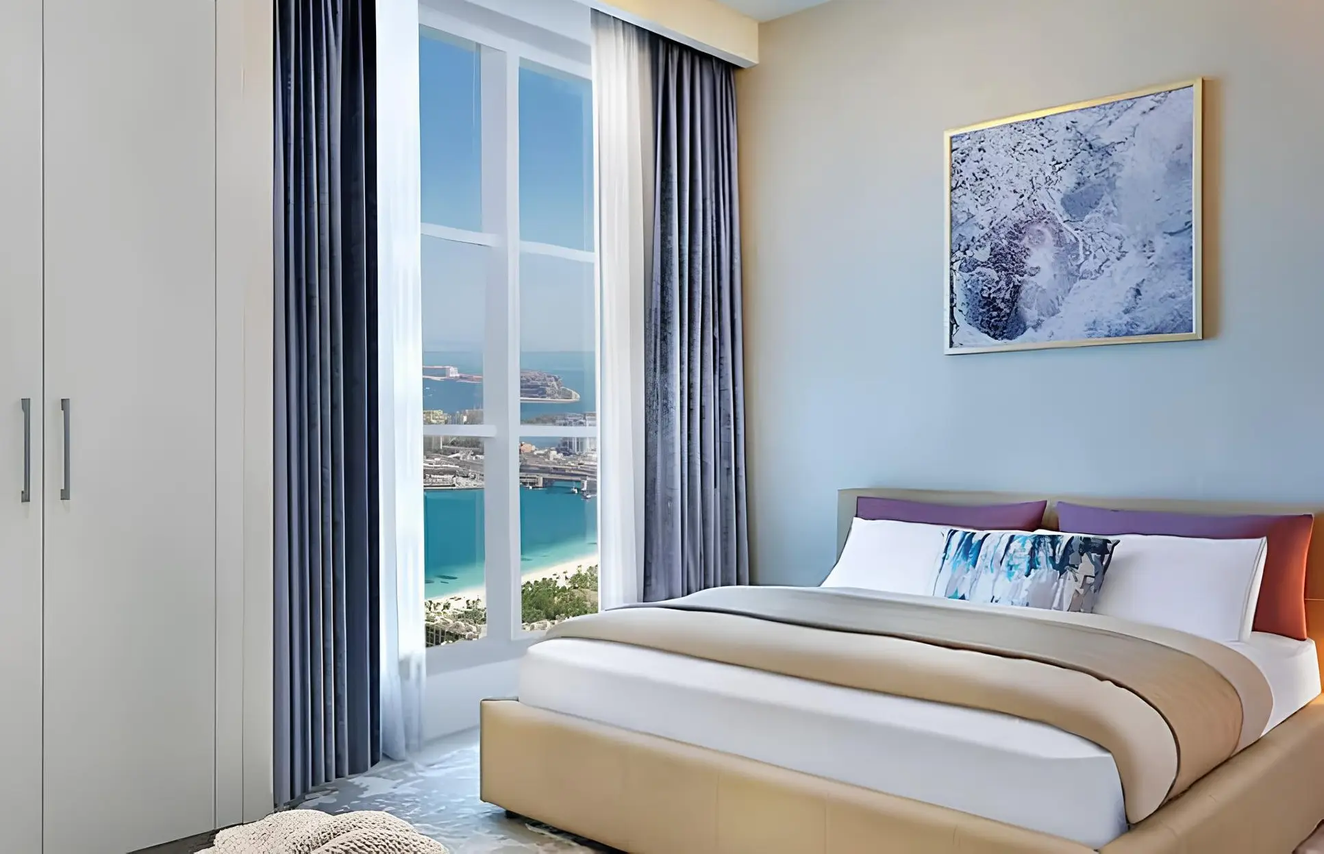 Bedroom with a waterfront window shown in the MADA'IN "Marina Arcade Tower" catalogue, Dubai